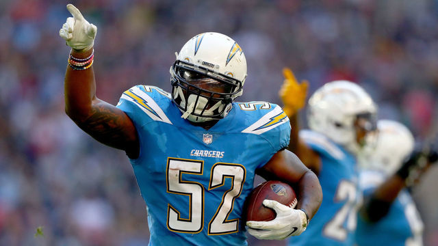 LONDON, ENGLAND - OCTOBER 21: Denzel Perryman of Los Angeles Chargers celebrates his interception during the NFL International Series match between Tennessee Titans and Los Angeles Chargers at Wembley Stadium on October 21, 2018 in London, England.