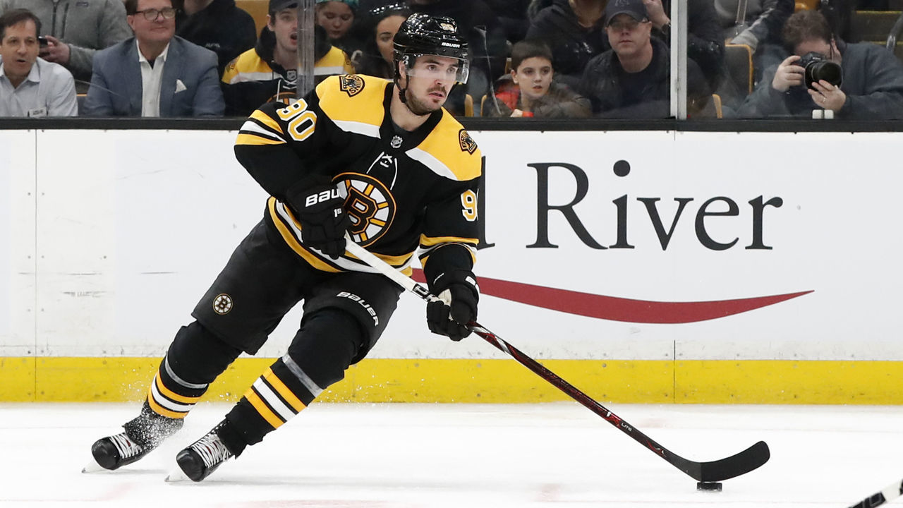 BOSTON, MA - FEBRUARY 26: Boston Bruins left wing Marcus Johansson (90) holds the puck during a game between the Boston Bruins and the San Jose Sharks on February 26, 2019, at TD Garden in Boston, Massachusetts.