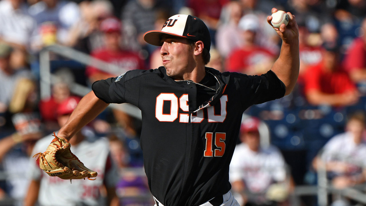 Omaha, NE - JUNE 26: Pitcher Luke Heimlich #15 of the Oregon State Beavers delivers a pitch in the first inning during game one of the College World Series Championship Series against the Arkansas Razorbacks on June 26, 2018 at TD Ameritrade Park in Omaha, Nebraska.