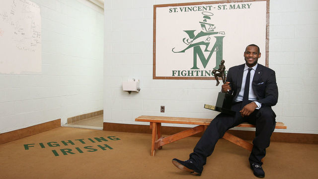 AKRON, OH - MAY 4: LeBron James poses with the 2008-2009 MVP Trophy on May 4, 2009 at St. Vincent-St. Mary's High School in Akron, Ohio. Mandatory Copyright Notice: Copyright 2009 NBAE