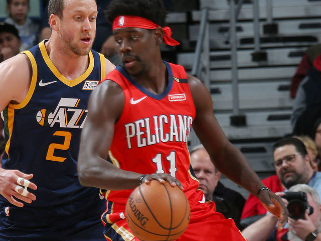 NEW ORLEANS, LA - MARCH 6: Jrue Holiday #11 of the New Orleans Pelicans handles the ball during the game against Joe Ingles #2 of the Utah Jazz on March 6, 2019 at the Smoothie King Center in New Orleans, Louisiana. Mandatory Copyright Notice: Copyright 2019 NBAE