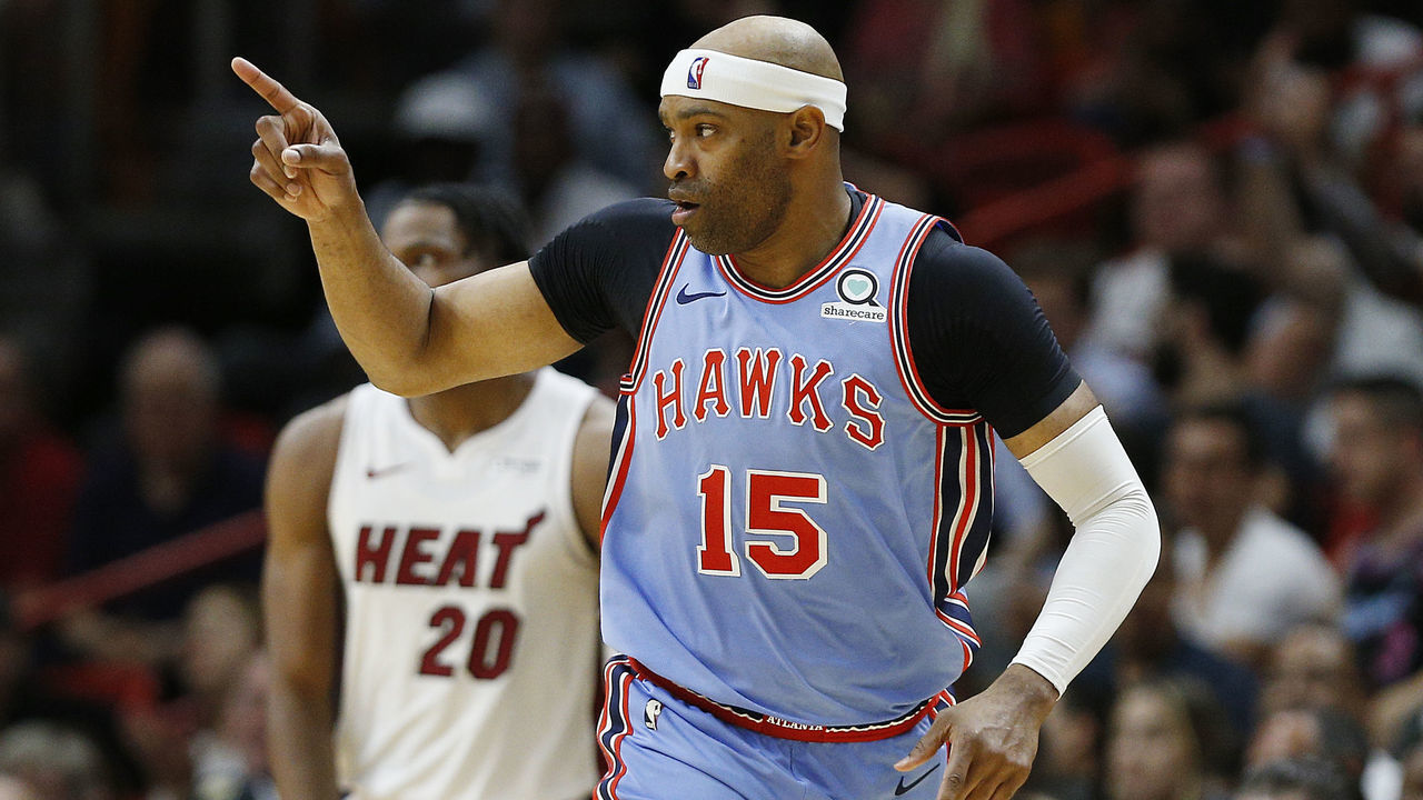 MIAMI, FLORIDA - MARCH 04: Vince Carter #15 of the Atlanta Hawks celebrates after a three pointer against the Miami Heat during the second half at American Airlines Arena on March 04, 2019 in Miami, Florida.