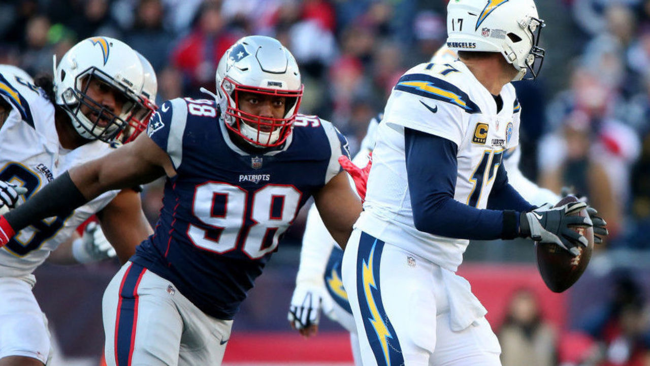 FOXBORO MA. - JANUARY 13: Trey Flowers (98) of the New England Patriots puts the pressure on Philip Rivers (17) of the Los Angeles Chargersduring the second quarter of the AFC Divisional playoff game at Gillette Stadium on January 13, 2019 in Foxboro, MA. (Staff Photo By Nancy Lane/MediaNews Group/Boston Herald)