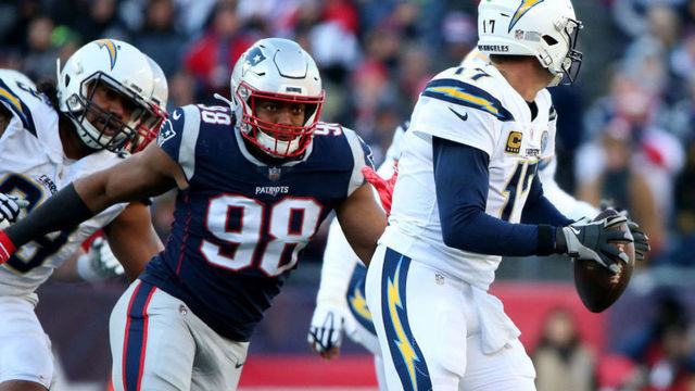 FOXBORO MA. - JANUARY 13: Trey Flowers (98) of the New England Patriots puts the pressure on Philip Rivers (17) of the Los Angeles Chargersduring the second quarter of the AFC Divisional playoff game at Gillette Stadium on January 13, 2019 in Foxboro, MA. (Staff Photo By Nancy Lane/MediaNews Group/Boston Herald)