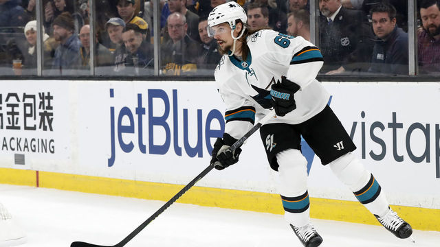 BOSTON, MA - FEBRUARY 26: San Jose Sharks defenseman Erik Karlsson (65) looks up ice during a game between the Boston Bruins and the San Jose Sharks on February 26, 2019, at TD Garden in Boston, Massachusetts.