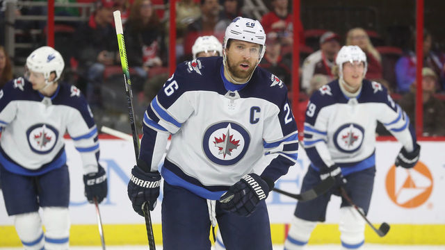 RALEIGH, NC - MARCH 08: Blake Wheeler #26 of the Winnipeg Jets skates with teammates after scoring the second goal of the night during an NHL game against the Carolina Hurricanes on March 8, 2019 at PNC Arena in Raleigh, North Carolina.