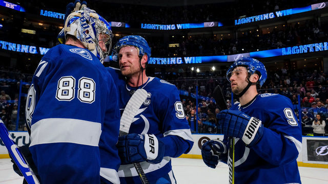 TAMPA, FL - MARCH 5: Goalie Andrei Vasilevskiy #88, Steven Stamkos #91, and Tyler Johnson #9 of the Tampa Bay Lightning celebrate the win against the Winnipeg Jets at Amalie Arena on March 5, 2019 in Tampa, Florida.