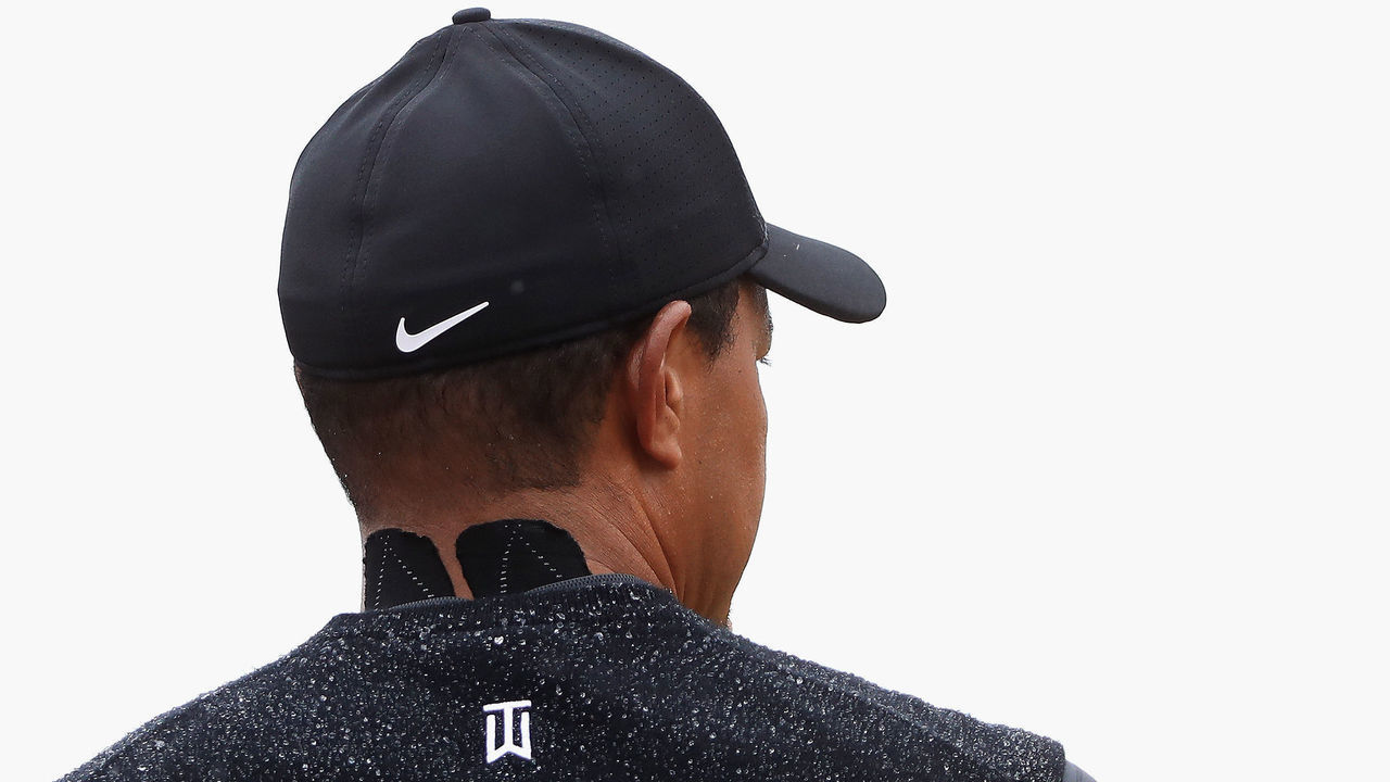 CARNOUSTIE, SCOTLAND - JULY 20: Tiger Woods of the United States wears kinesiology tape on his neck during the second round of the 147th Open Championship at Carnoustie Golf Club on July 20, 2018 in Carnoustie, Scotland.