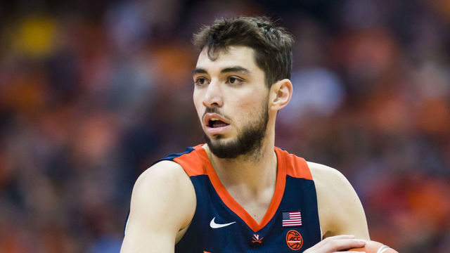 SYRACUSE, NY - MARCH 04: Ty Jerome #11 of the Virginia Cavaliers handles the ball during the first half against the Syracuse Orange at the Carrier Dome on March 4, 2019 in Syracuse, New York. Virginia defeats Syracuse 79-53.