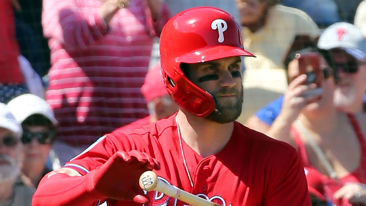 CLEARWATER, FL - MARCH 09: Bryce Harper (3) of the Phillies looks into the Blue Jays dugout as he walks to the plate before his first at bat as a Philadelphia Phillies player during the spring training game between the Toronto Blue Jays and the Philadelphia Phillies on March 09, 2019 at the Spectrum Field in Clearwater, Florida.