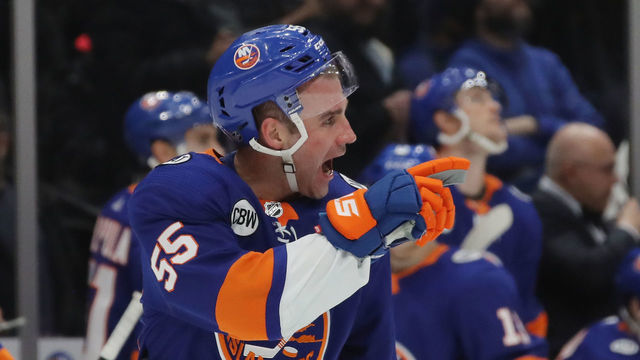 UNIONDALE, NEW YORK - MARCH 09: Johnny Boychuk #55 of the New York Islanders signals at Jakub Voracek #93 of the Philadelphia Flyers as he leaves the ice following a hit during the third period at NYCB Live's Nassau Coliseum on March 09, 2019 in Uniondale, New York. The Flyers defeated the Islanders 5-2.