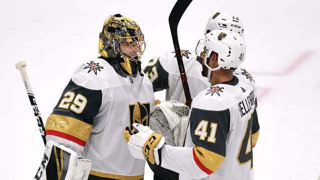 ANAHEIM, CA - MARCH 01: Vegas Golden Knights goalie Marc-Andre Fleury (29) with center Pierre-Edouard Bellemare (41) after the Golden Knights defeated the Anaheim Ducks 3 to 0 in a game played on March 1, 2019 at the Honda Center in Anaheim, CA.