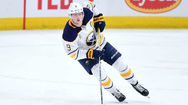 CHICAGO, IL - MARCH 07: Buffalo Sabres center Jack Eichel (9) skates with the puck in game action during a NHL game between the Chicago Blackhawks and the Buffalo Sabres on March 07, 2019, at the United Center in Chicago, IL.
