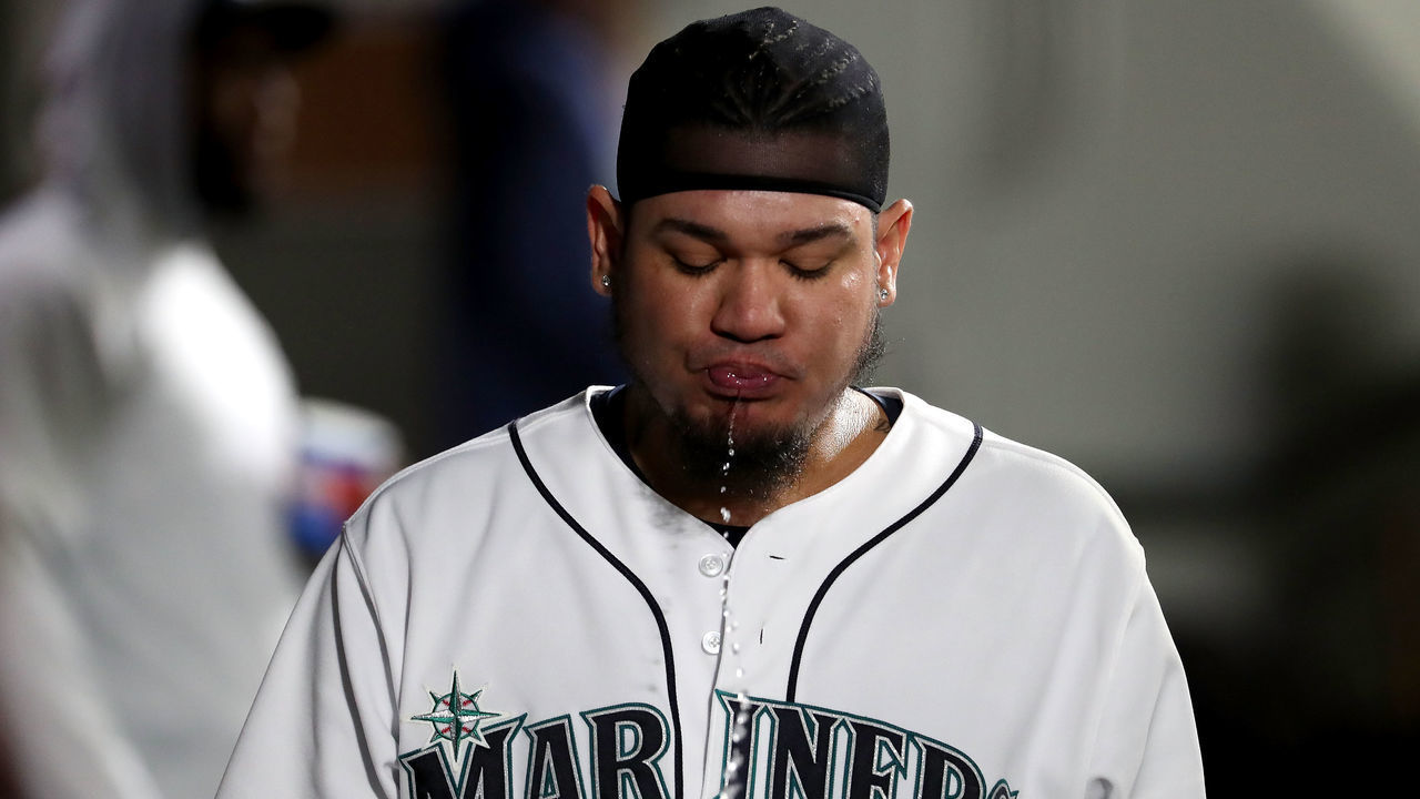 SEATTLE, WA - SEPTEMBER 26: Felix Hernandez #34 of the Seattle Mariners reacts in the dugout after being pulled from the game in the fourth inning against the Oakland Athletics during their game at Safeco Field on September 26, 2018 in Seattle, Washington.