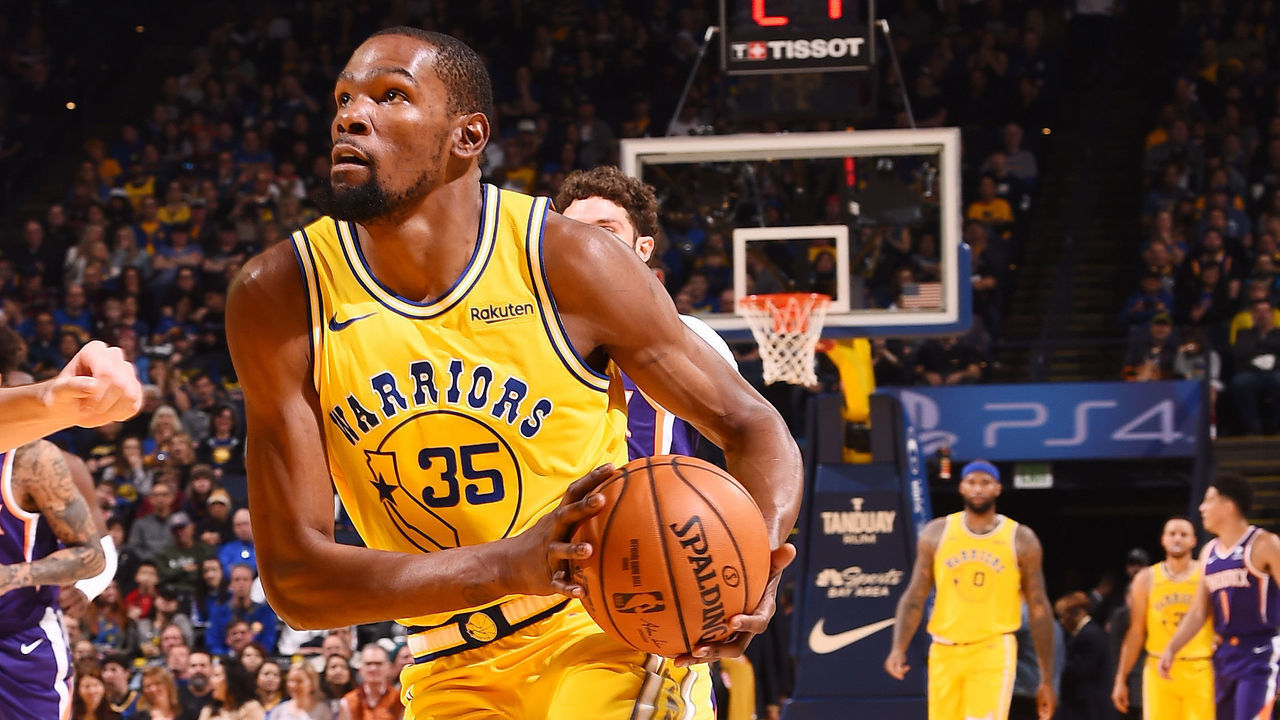 OAKLAND, CA - MARCH 10: Kevin Durant #35 of the Golden State Warriors handles the ball against the Phoenix Suns on March 10, 2019 at ORACLE Arena in Oakland, California. NOTE TO USER: User expressly acknowledges and agrees that, by downloading and or using this photograph, user is consenting to the terms and conditions of Getty Images License Agreement. Mandatory Copyright Notice: Copyright 2019 NBAE
