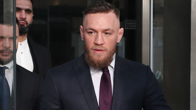 Conor McGregor leaves Dublin District Court after appearing in relation to motoring offences.