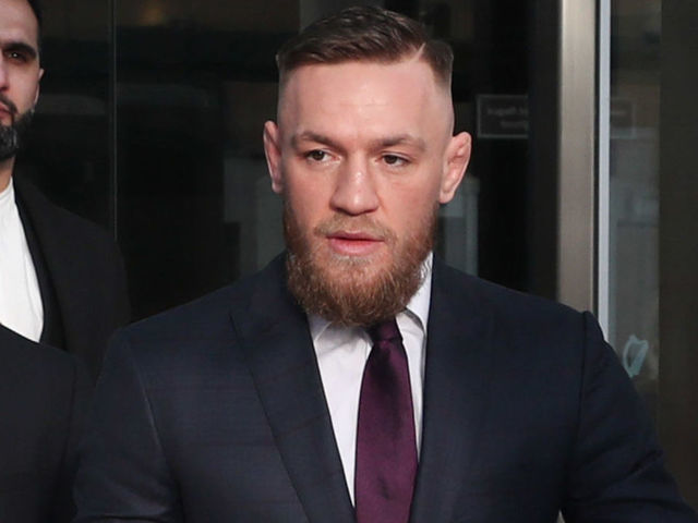 Conor McGregor leaves Dublin District Court after appearing in relation to motoring offences.