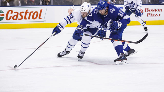 TORONTO, ON - MARCH 11: Morgan Rielly #44 of the Toronto Maple Leafs battles against Alex Killorn #17 of the Tampa Bay Lightning during the third period at the Scotiabank Arena on March 11, 2019 in Toronto, Ontario, Canada.