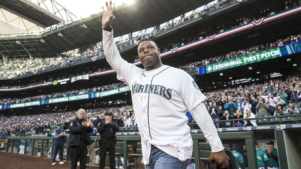 SEATTLE, WA - APRIL 14: Seattle Mariners Hall of Famer Ken Griffey Jr., acknowledges the crowd before the ceremonial first pitch prior to a game between the Texas Rangers and the Seattle Mariners at Safeco Field on April 14, 2017 in Seattle, Washington. The Mariners won 2-1.
