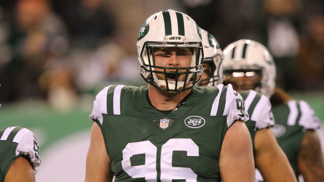 EAST RUTHERFORD, NJ - DECEMBER 15: Defensive Lineman Henry Anderson #96 of the New York Jets has a sack of Quarterback Deshaun Watson #4 of the Houston Texans at MetLife Stadium on December 15, 2018 in East Rutherford, New Jersey.