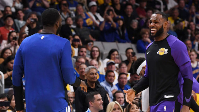 SAN JOSE, CA - OCTOBER 12: Draymond Green #23 of the Golden State Warriors and LeBron James #23 of the Los Angeles Lakers show emotion during the game on October 12, 2018 at SAP Center in San Jose, California. NOTE TO USER: User expressly acknowledges and agrees that, by downloading and or using this photograph, user is consenting to the terms and conditions of Getty Images License Agreement. Mandatory Copyright Notice: Copyright 2018 NBAE