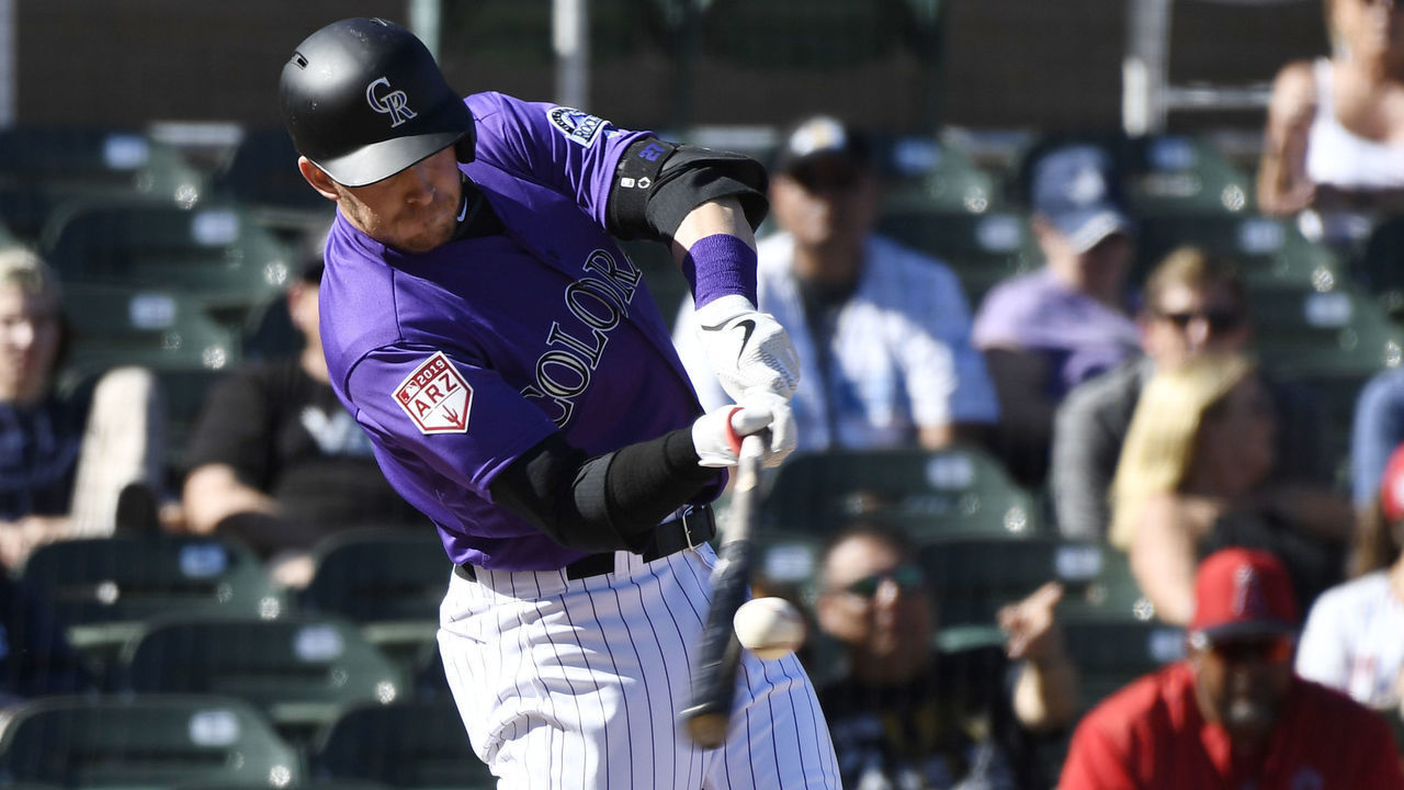 SCOTTSDALE, AZ - FEBRUARY 27: Colorado Rockies shortstop Trevor Story (27) hits a 439 ft. solo home run against the Los Angeles Angels in the 5th inning at Salt River Fields February 27, 2019.