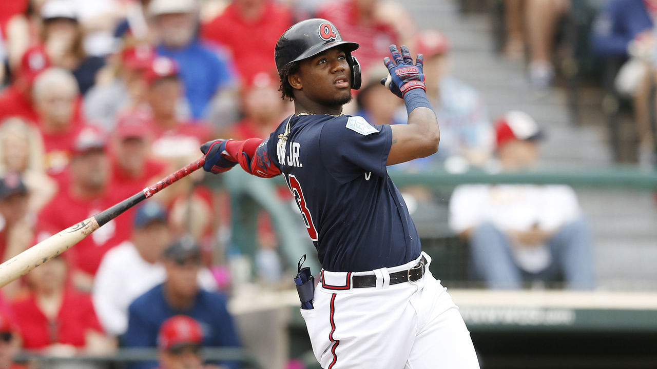 LAKE BUENA VISTA, FLORIDA - MARCH 12: Ronald Acuna Jr. #13 of the Atlanta Braves hits a double in the second inning against the St. Louis Cardinals during the Grapefruit League spring training game at Champion Stadium on March 12, 2019 in Lake Buena Vista, Florida.