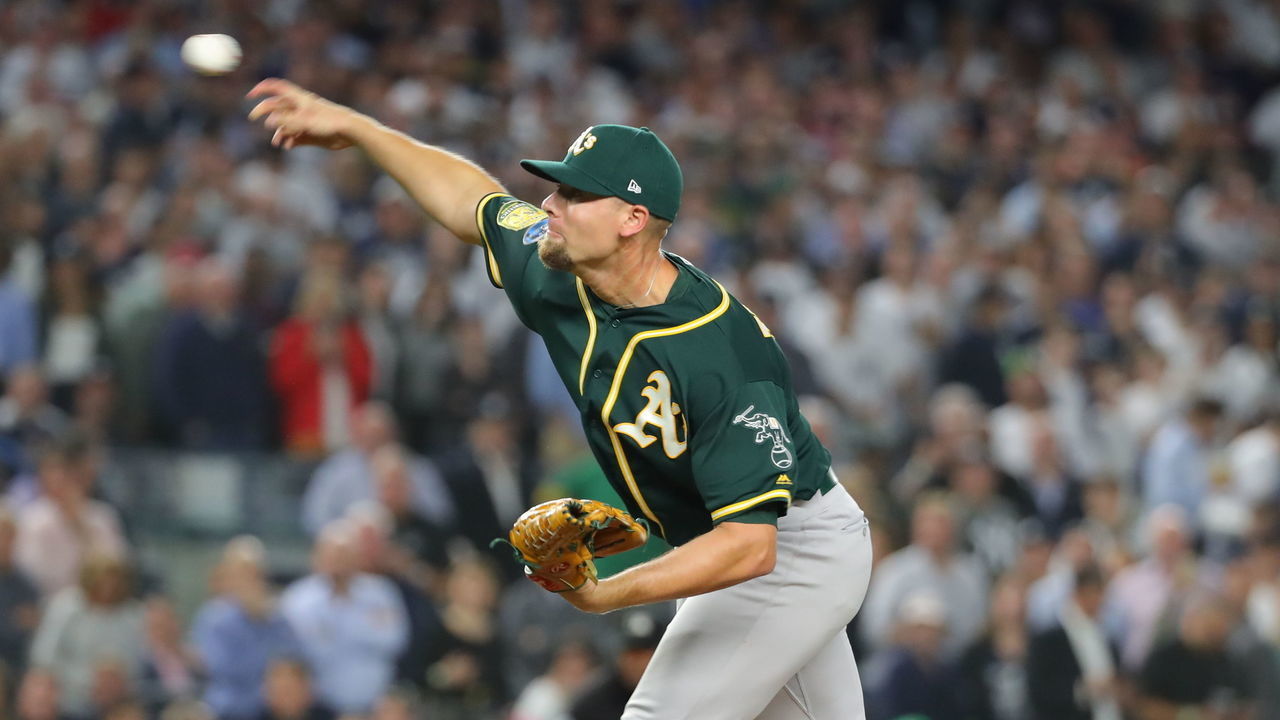 NEW YORK, NY - OCTOBER 3: Blake Treinen #39 of the Oakland Athletics pitches during the American League Wild Card game against the New York Yankees at Yankee Stadium on Wednesday, October 3, 2018 in the Bronx borough of New York City.