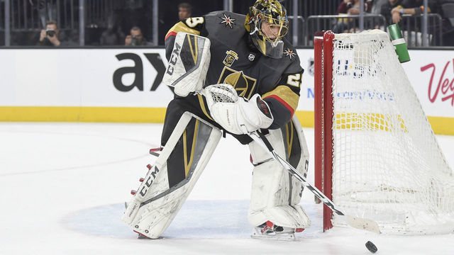 LAS VEGAS, NV - DECEMBER 23: Marc-Andre Fleury #29 of the Vegas Golden Knights handles the puck against the Washington Capitals during the game at T-Mobile Arena on December 23, 2017 in Las Vegas, Nevada.