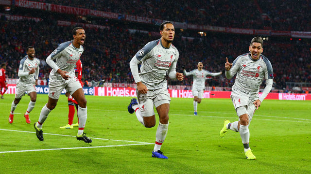 MUNICH, GERMANY - MARCH 13: Virgil van Dijk of Liverpool celebrates scoring his side's second goal during the UEFA Champions League Round of 16 Second Leg match between FC Bayern Muenchen and Liverpool at Allianz Arena on March 13, 2019 in Munich, Bavaria.