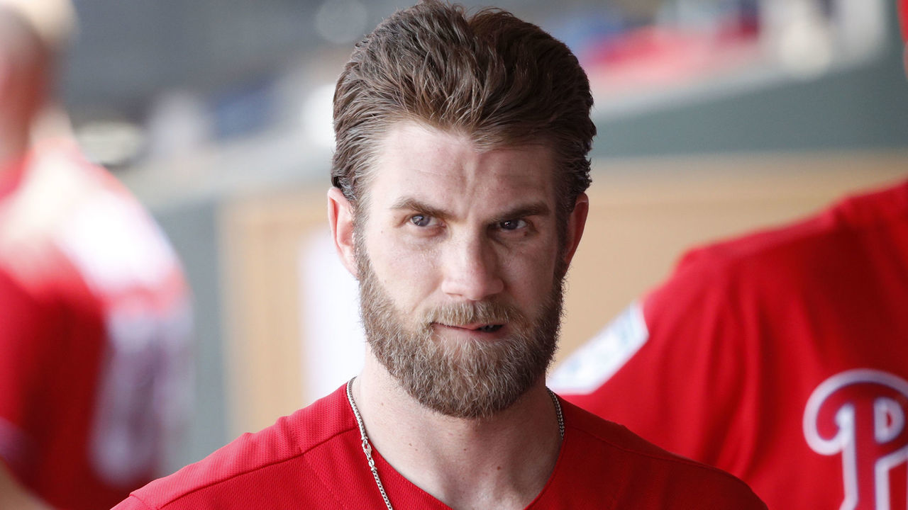 CLEARWATER, FL - MARCH 11: Bryce Harper #3 of the Philadelphia Phillies looks on while in the dugout in the fifth inning of a Grapefruit League spring training game against the Tampa Bay Rays at Spectrum Field on March 11, 2019 in Clearwater, Florida.