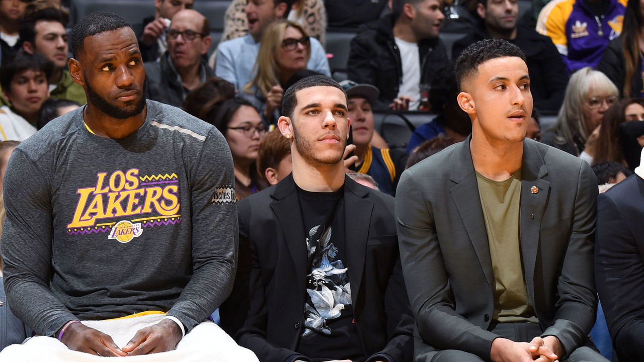 LOS ANGELES, CA - MARCH 9: LeBron James #23, Lonzo Ball #2, Kyle Kuzma #0, and Lance Stephenson #6 of the Los Angeles Lakers look on during the game against the Boston Celtics on March 9, 2019 at STAPLES Center in Los Angeles, California. NOTE TO USER: User expressly acknowledges and agrees that, by downloading and/or using this photograph, user is consenting to the terms and conditions of the Getty Images License Agreement. Mandatory Copyright Notice: Copyright 2019 NBAE