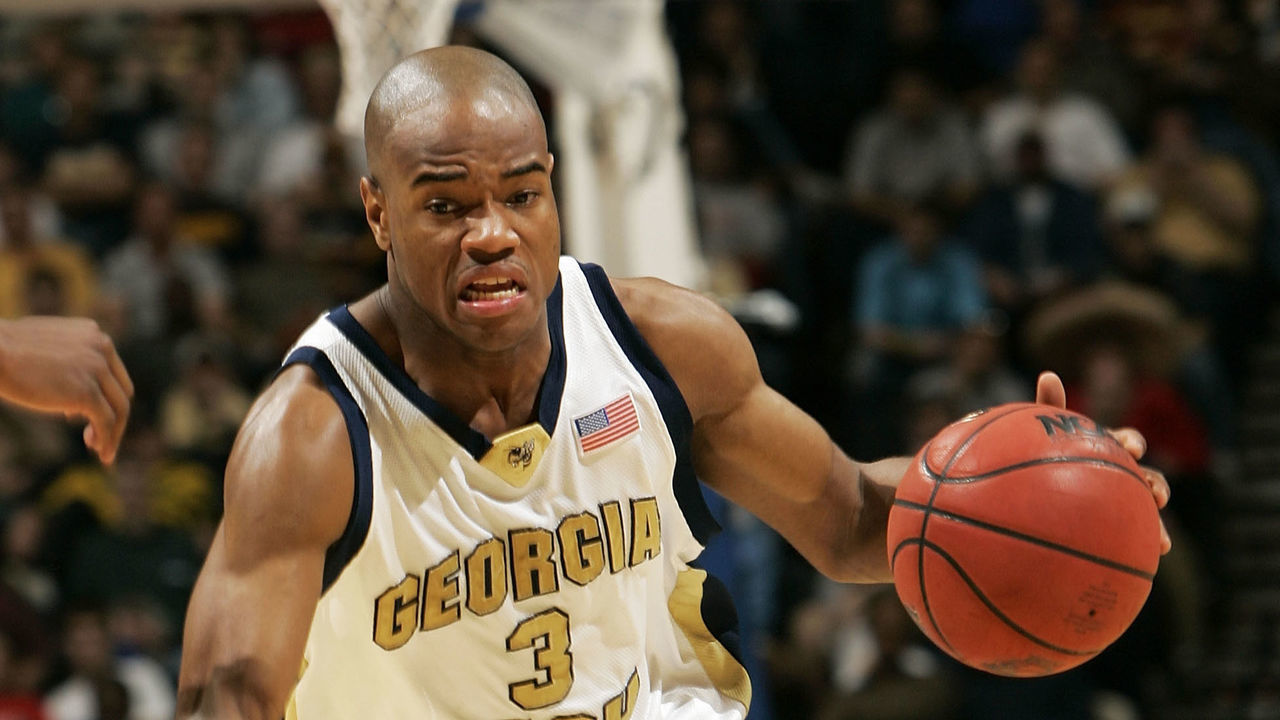 NASHVILLE, TN - MARCH 18: Jarrett Jack #3 of the Georgia Tech Yellow Jackets drives against the George Washington Colonials in the first round of the NCAA Division I Men's Basketball Championship at the Gaylord Entertainment Center on March 18, 2005 in Nashville, Tennessee.