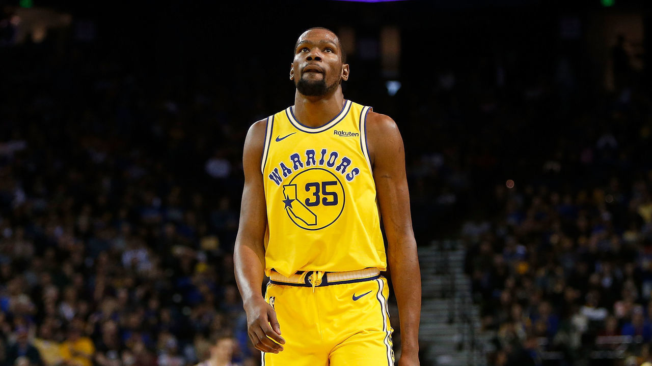 OAKLAND, CA - MARCH 10: Kevin Durant #35 of the Golden State Warriors looks on during the game against the Phoenix Suns at ORACLE Arena on March 10, 2019 in Oakland, California.