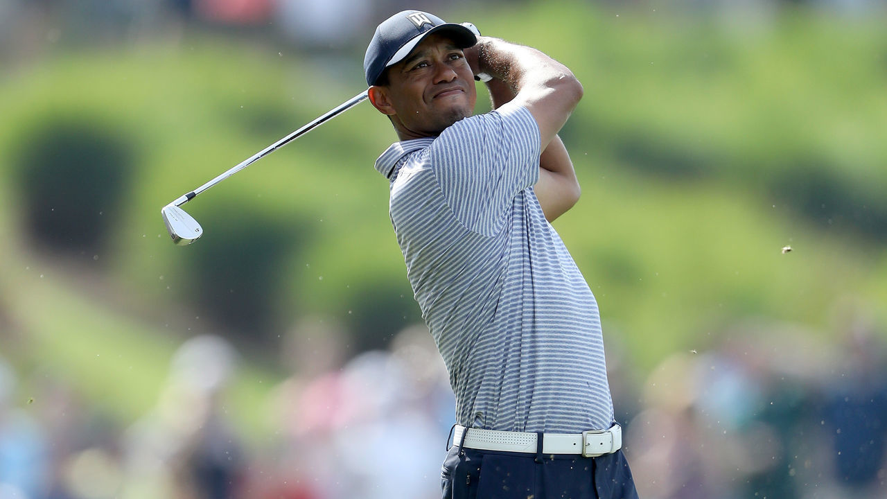 PONTE VEDRA BEACH, FLORIDA - MARCH 15: Tiger Woods of the United States plays his second shot on the par 4, 18th hole during the second round of the 2019 Players Championship held on the Stadium Course at TPC Sawgrass on March 15, 2019 in Ponte Vedra Beach, Florida.