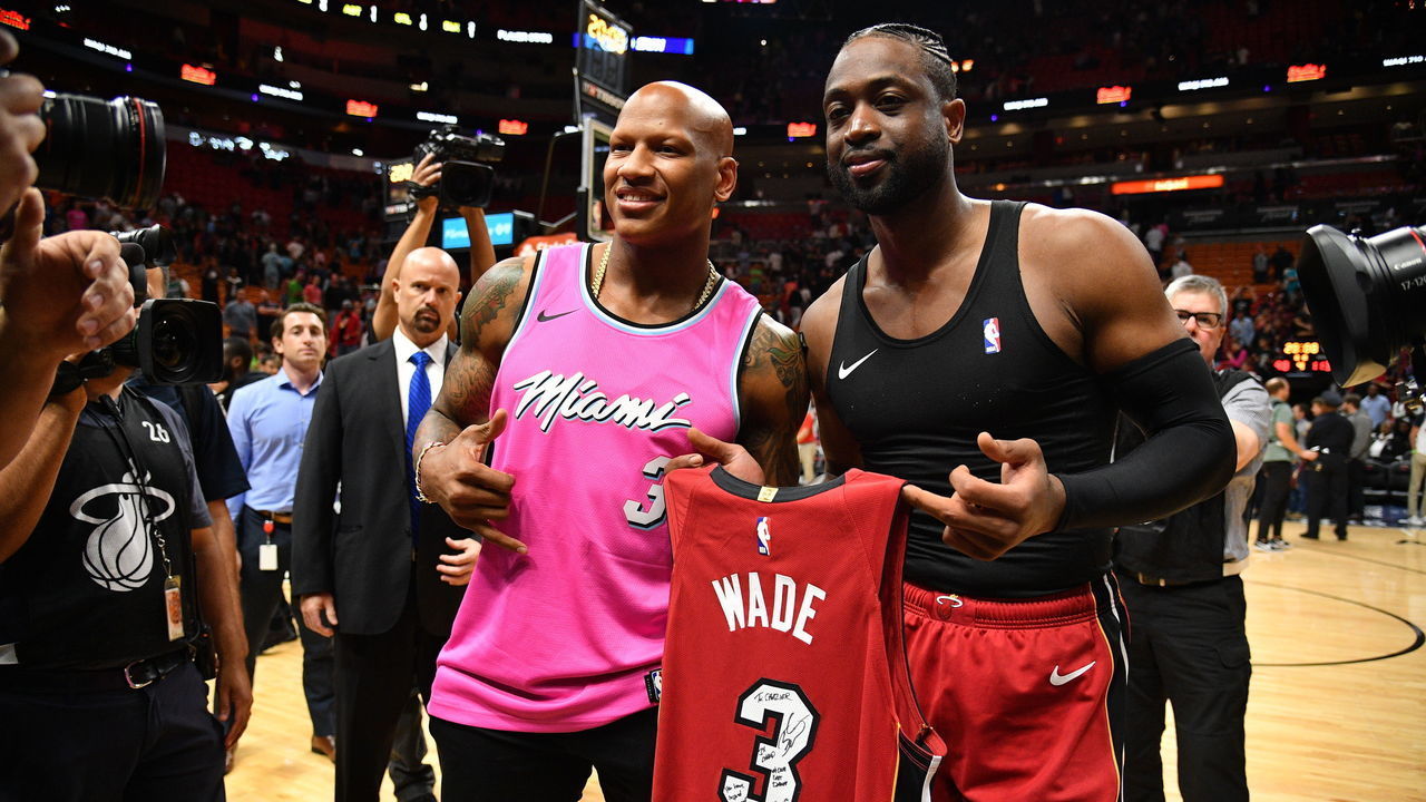 MIAMI, FL - MARCH 15: Dwyane Wade #3 of the Miami Heat gives a jersey to Pittsburgh Steeler Ryan Shazier after the game between the Miami Heat and the Milwaukee Bucks at American Airlines Arena on March 15, 2019 in Miami, Florida.