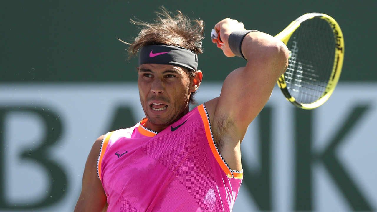 INDIAN WELLS, CALIFORNIA - MARCH 15: Rafael Nadal of Spain returns a shot to Karen Khachanov of Russia during the quarterfinals of the BNP Paribas Open at the Indian Wells Tennis Garden on March 15, 2019 in Indian Wells, California.