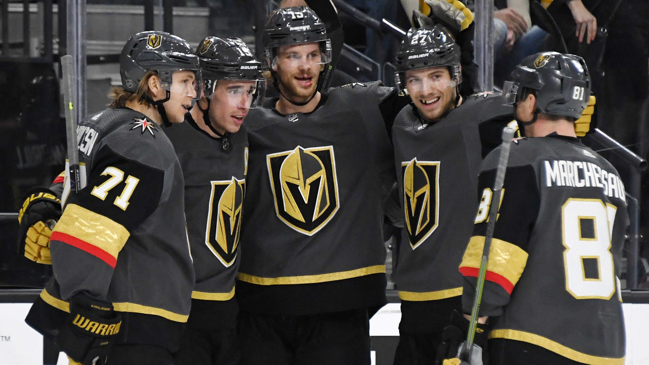 LAS VEGAS, NEVADA - FEBRUARY 28: William Karlsson #71, Reilly Smith #19, Jon Merrill #15, Shea Theodore #27 and Jonathan Marchessault #81 of the Vegas Golden Knights celebrate after Smith scored a second-period goal against the Florida Panthers during their game at T-Mobile Arena on February 28, 2019 in Las Vegas, Nevada. The Golden Knights defeated the Panthers 6-5 in a shootout.