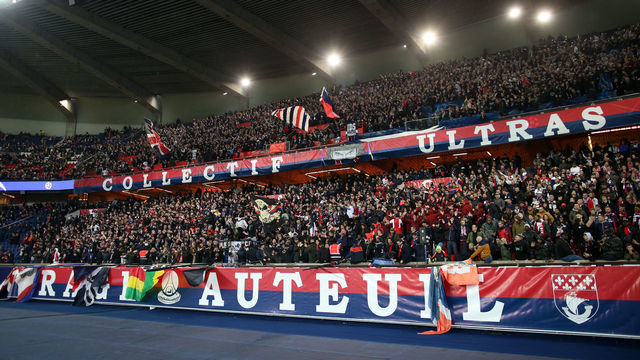 PARIS, FRANCE - MARCH 06: the PSG Ultras in the Virage Auteuil during the UEFA Champions League Round of 16 Second Leg match between Paris Saint-Germain and Manchester United at Parc des Princes on March 6, 2019 in Paris, .