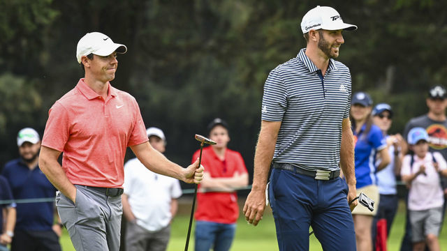 MEXICO CITY, MEX - FEBRUARY 24: Dustin Johnson and Rory McIlroy of Northern Ireland smile after McIlroy almost made an eagle putt on the 15th hole green during the final round of the World Golf Championships - Mexico Championship at Club de Golf Chapultepec on February 24, 2019 in Mexico City, Mexico.