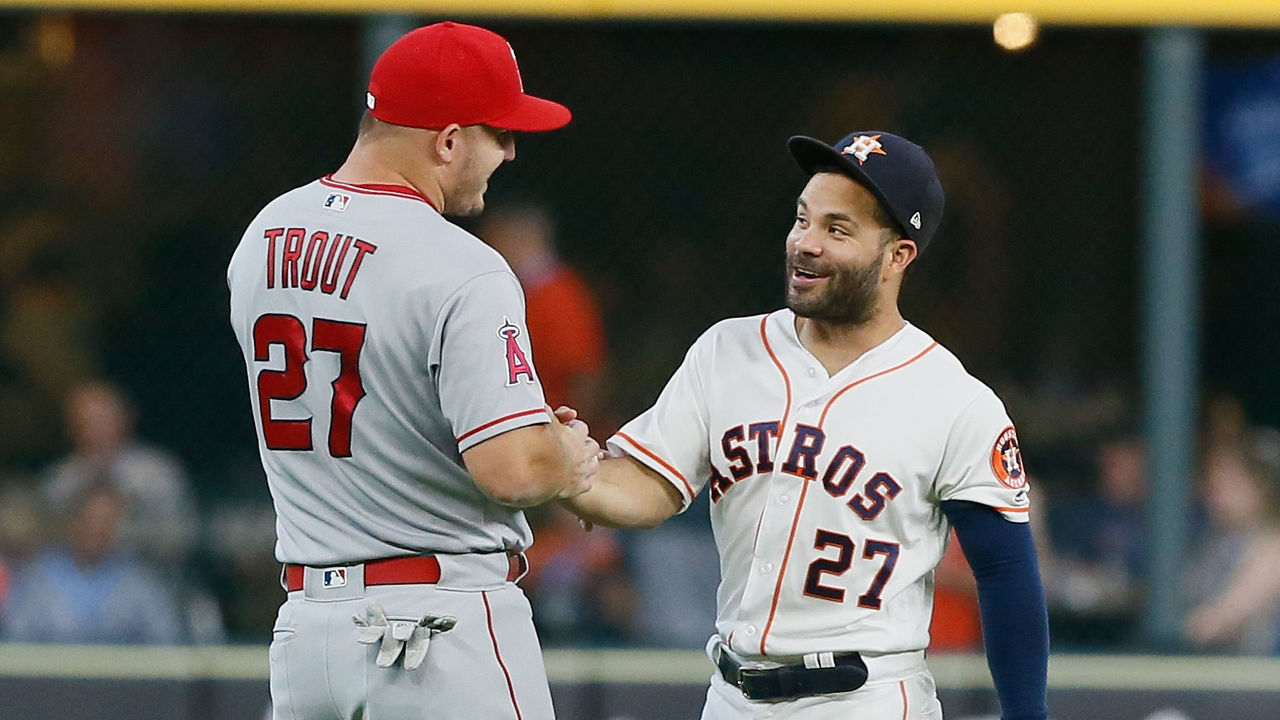 HOUSTON, TX - AUGUST 30: Mike Trout #27 of the Los Angeles Angels of Anaheim talks with Jose Altuve #27 of the Houston Astros before a baseball game at Minute Maid Park on August 30, 2018 in Houston, Texas.