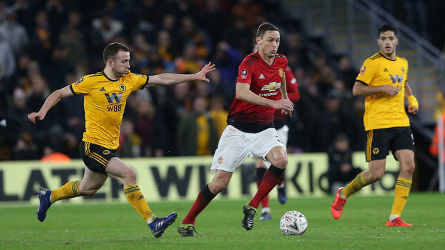 WOLVERHAMPTON, ENGLAND - MARCH 16: Nemanja Matic of Manchester United in action with Diogo Jota of Wolverhampton Wanderers during the FA Cup Quarter Final match between Wolverhampton Wanderers and Manchester United at Molineux on March 16, 2019 in Wolverhampton, England.