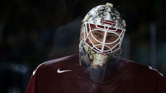 Latvia's goalkeeper Elvis Merzlikins reacts during the IIHF Men's World Championship Ice Hockey match between Germany and Latvia in Cologne, western Germany, on May 16, 2017. / AFP PHOTO / Ina FASSBENDER
