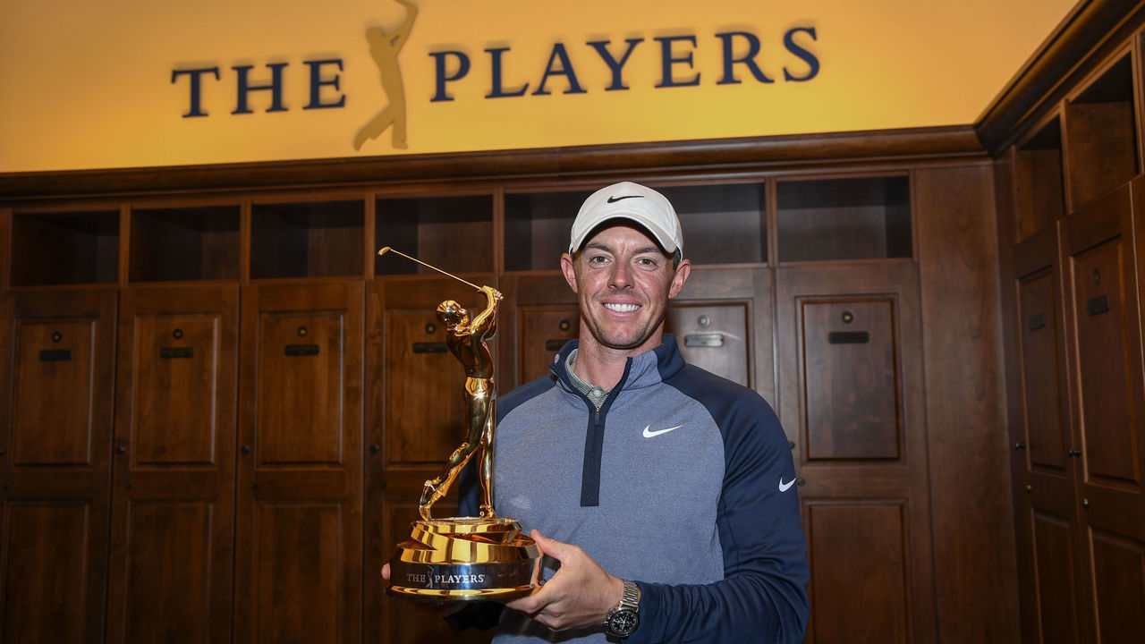 PONTE VEDRA BEACH, FL - MARCH 17: Rory McIlroy of Northern Ireland with THE PLAYERS Championship trophy in the Champions locker room after the final round of THE PLAYERS Championship on THE PLAYERS Stadium Course at TPC Sawgrass on March 17, 2019, in Ponte Vedra Beach .