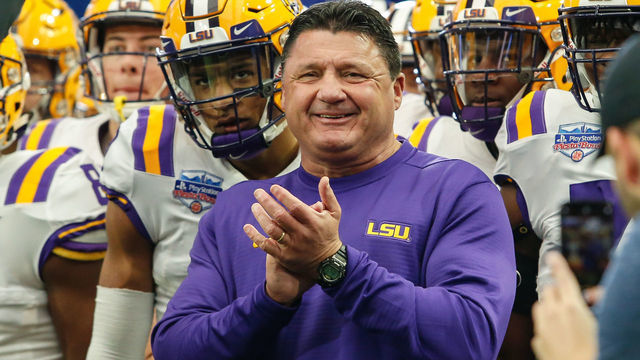 GLENDALE, AZ - JANUARY 01: LSU Tigers head coach Ed Orgeron smiles as his team prepares to run onto the field before the college football game between the UCF Knights and the LSU Tigers on January 1, 2019 at State Farm Stadium in Glendale, Arizona.