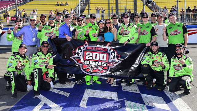 FONTANA, CALIFORNIA - MARCH 17: Kyle Busch, driver of the #18 Interstate Batteries Toyota, celebrates in victory lane after winning the Monster Energy NASCAR Cup Series Auto Club 400 and winning his 200th NASCAR race at Auto Club Speedway on March 17, 2019 in Fontana, California.