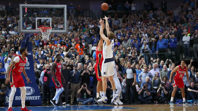 DALLAS, TEXAS - MARCH 18: Dirk Nowitzki #41 of the Dallas Mavericks scores a basket against Kenrich Williams #34 of the New Orleans Pelicans to become the sixth all-time leading scorer in the NBA at American Airlines Center on March 18, 2019 in Dallas, Texas.