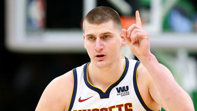 BOSTON, MASSACHUSETTS - MARCH 18: Nikola Jokic #15 of the Denver Nuggets celebrates after scoring against the Boston Celtics during the second half at TD Garden on March 18, 2019 in Boston, Massachusetts. The Nuggets defeat the Celtics 114-105.
