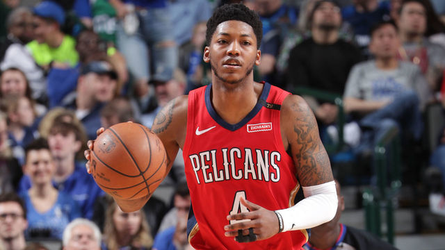 DALLAS, TX - MARCH 18: Elfrid Payton #4 of the New Orleans Pelicans dribbles up court against the Dallas Mavericks on March 18, 2019 at the American Airlines Center in Dallas, Texas. Mandatory Copyright Notice: Copyright 2019 NBAE