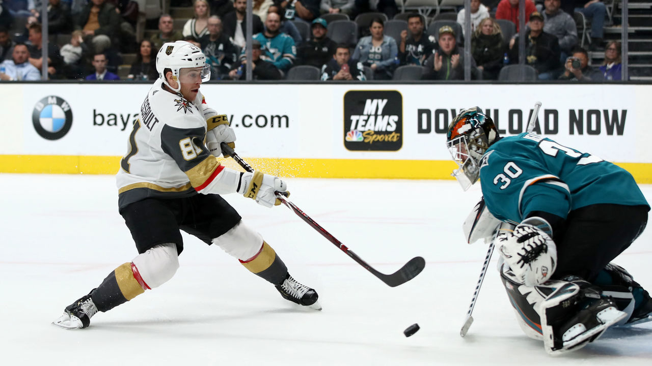 SAN JOSE, CALIFORNIA - MARCH 18: Aaron Dell #30 of the San Jose Sharks makes a save on a shot taken by Jonathan Marchessault #81 of the Vegas Golden Knights at SAP Center on March 18, 2019 in San Jose, California.